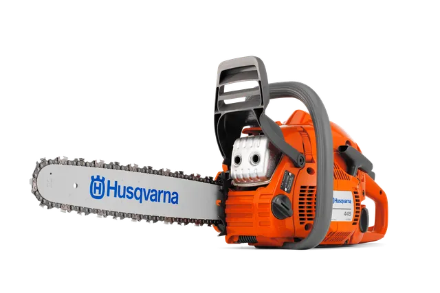 Side view of a Husqvarna chainsaw with visible branding and blade.