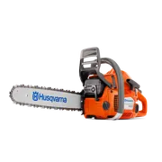 Side view of a Husqvarna chainsaw with visible branding on the blade.