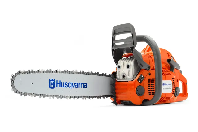 Side view of a Husqvarna chainsaw with visible branding on the blade.