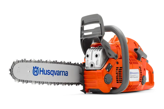 Side view of a Husqvarna chainsaw with visible branding and model number.