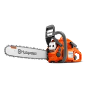 Side view of a Husqvarna chainsaw with X-Torq engine technology.