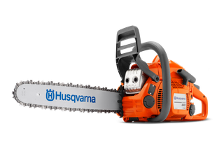 Side view of a Husqvarna chainsaw with its components disassembled.