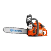 Side view of a Husqvarna chainsaw with its components disassembled.