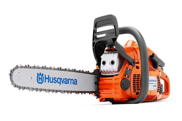 Front view of a Husqvarna chainsaw with visible blade and handle.