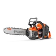 Side view of a Husqvarna chainsaw with visible branding on the blade.