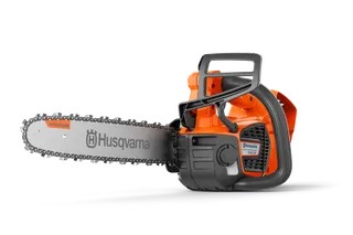 Side view of a Husqvarna chainsaw with visible branding on the blade.
