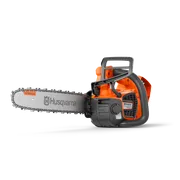 Side view of a Husqvarna chainsaw with visible branding on the blade.