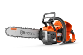 Side view of a Husqvarna chainsaw with ergonomic handle and visible branding.