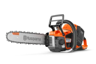 Side view of a Husqvarna chainsaw with visible branding on the blade.
