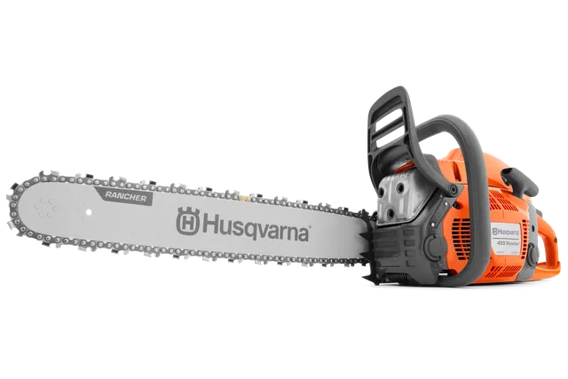 Side view of a Husqvarna chainsaw with visible branding on the blade.