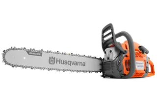 Side view of a Husqvarna chainsaw with visible branding on the blade.