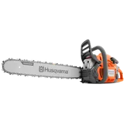 Side view of a Husqvarna chainsaw with visible branding on the blade.