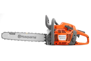 Side view of a Husqvarna 455 Rancher chainsaw with visible branding.