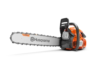 Side view of a Husqvarna chainsaw with X-Precision branding on the blade.