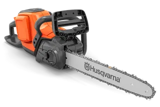 Side view of a Husqvarna chainsaw with a visible chain and handle.