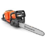 Side view of a Husqvarna chainsaw with a visible chain and handle.