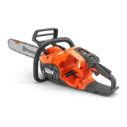 Side view of a Husqvarna chainsaw with ergonomic handle.