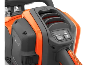 Close-up of a Husqvarna product showing control buttons and air vents.