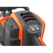 Close-up of a Husqvarna product showing control buttons and air vents.