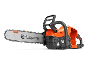 Side view of a Husqvarna chainsaw with visible chain and handle.