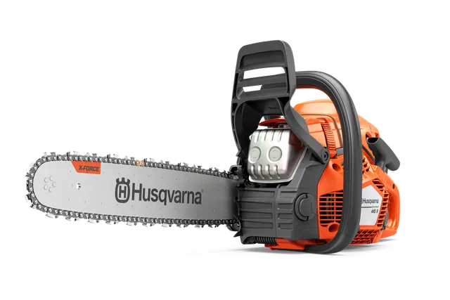 Side view of a Husqvarna chainsaw showcasing its blade and ergonomic handle.
