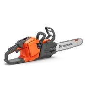 Side view of a chainsaw, showcasing its ergonomic handle and cutting bar.