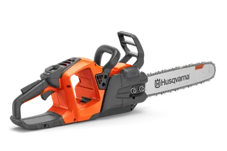 Side view of a chainsaw with ergonomic handle.