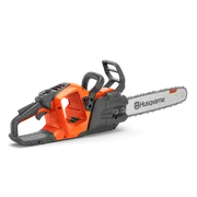 Side view of a chainsaw with ergonomic handle.