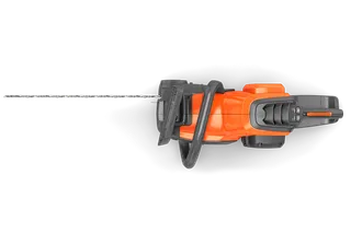 Top view of a Husqvarna chainsaw showcasing its ergonomic handle and control buttons.