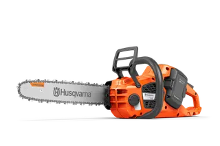 Husqvarna 435i. Side view of a Husqvarna chainsaw with battery compartment.