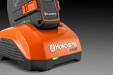 Close-up view of a Husqvarna C750X product with visible branding.