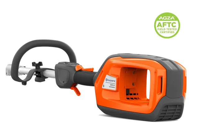Studio close-up of a handheld garden power tool showing its battery compartment, with an “AGZA AFTC Field Tested Certified” badge in the top-right.