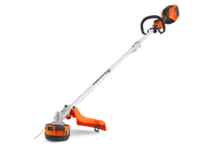 Side view of a Husqvarna string trimmer with ergonomic handle and battery compartment.