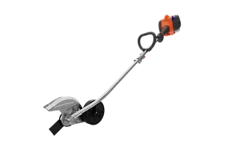 Side view of a garden edger with a curved shaft and a protective blade guard.