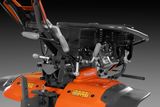 Вид збоку на культиватор Husqvarna, що демонструє двигун і ручки керування.