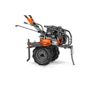 Вид збоку на культиватор Husqvarna з видимим двигуном і ручками керування.