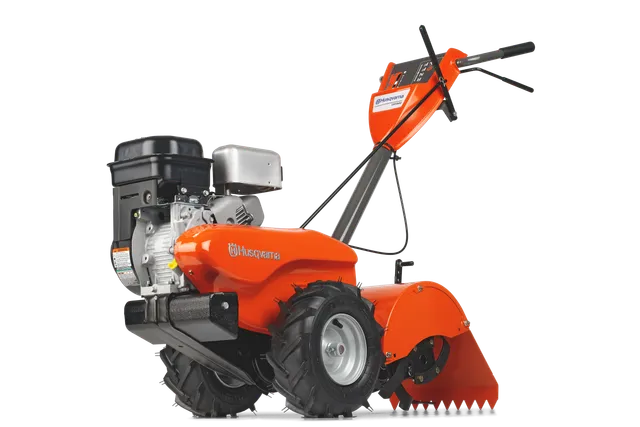 Side view of a Husqvarna tiller showcasing its engine and control handles.