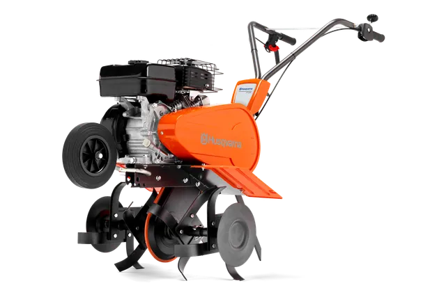 Side view of a Husqvarna tiller with visible engine and blades.