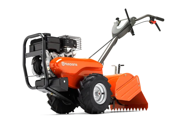 HUSQVARNA TR 430 Dual. Seitenansicht einer Husqvarna Motorhacke mit robustem Motor und Lenkerbedienelementen.