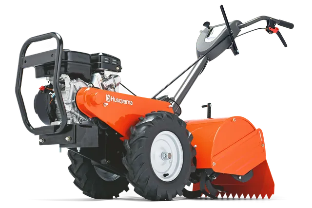 HUSQVARNA TR 430. Seitenansicht einer Husqvarna Motorhacke mit sichtbarem Motor und Lenker.