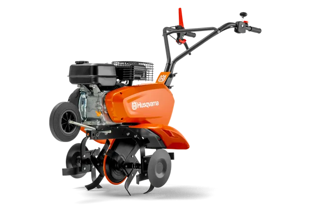 A motort és a lapátokat bemutató Husqvarna kormányrúd oldalnézete.