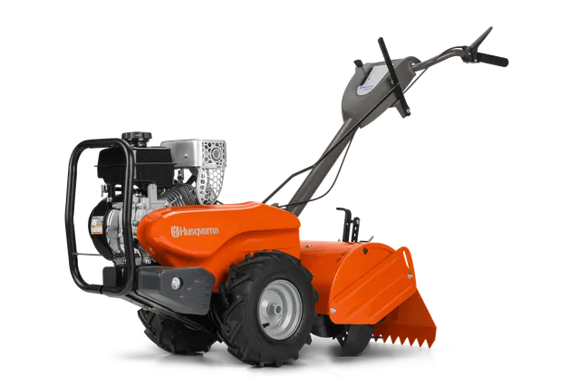 Side view of a Husqvarna tiller showcasing its engine and control handles.