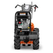 HUSQVARNA TR 430. Vista trasera de una motoazada en la que se muestran el motor y las palancas de control.
