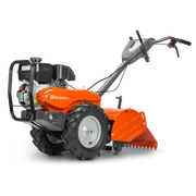 HUSQVARNA TR 430. Vista lateral de una motoazada Husqvarna con ruedas robustas y un motor potente.