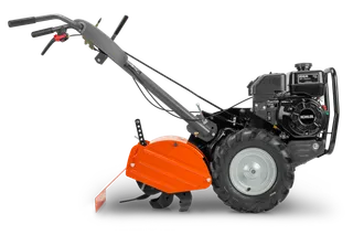 HUSQVARNA TR 430. Vista lateral de una motoazada con motor Kohler y ruedas robustas.