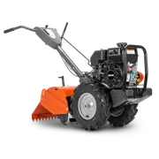 HUSQVARNA TR 430. Vista lateral de una motoazada con ruedas grandes y un motor potente.
