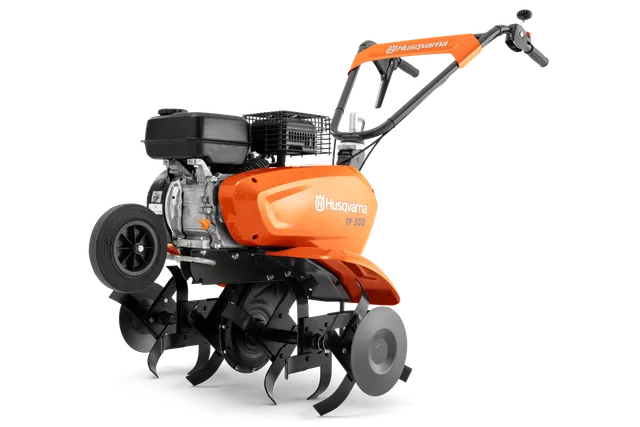 Side view of a Husqvarna TF 335 tiller with visible engine and blades.