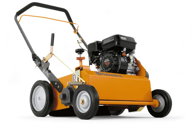 DT18. Side view of a lawn dethatcher with a visible engine and handle.
