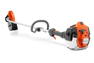 HUSQVARNA 525ECS. Side view of a Husqvarna brush cutter with ergonomic handle and cutting blade.