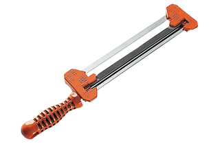 Front view of a chainsaw sharpening tool with ergonomic handle.
